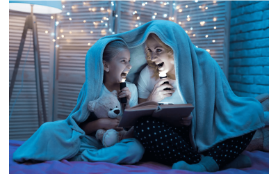 Mother and daughter reading a bedtime story.