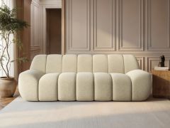 Macy large 3 seater sofa in cream textured fabric with sculpted panel design in a modern living room
