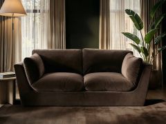 3 seater velvet sofa with minimalist design and deep cushioned seating 
